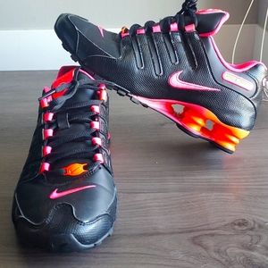 Womens Nike Shocks. Black, pink and orange. Size 8.5. Worn few times.